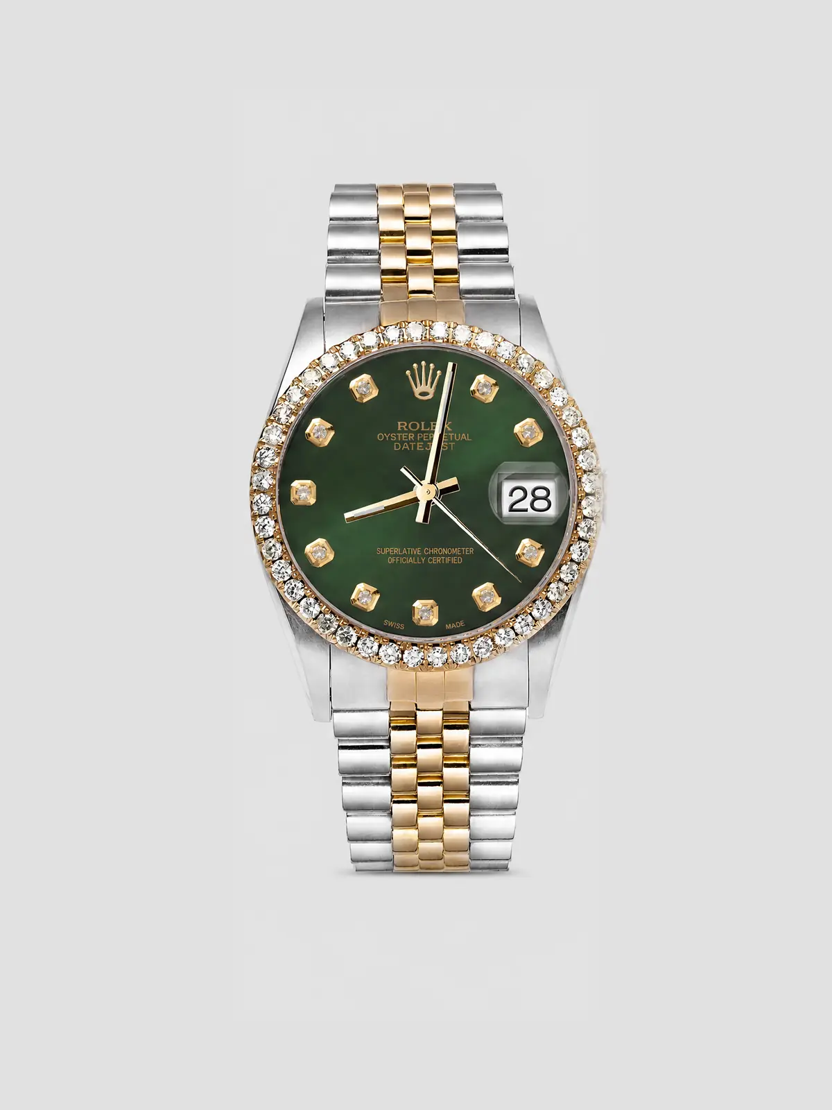 A two-tone Rolex Datejust with a diamond bezel and green dial on light grey (illustrative, generated)